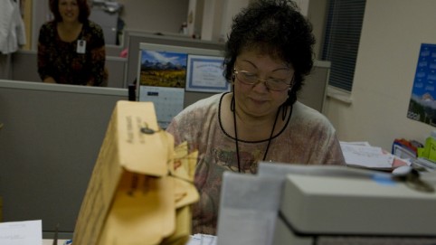 Woman working with documents.